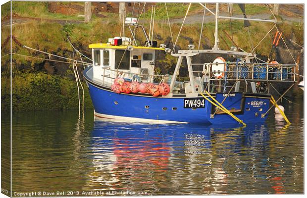 Blue Fishing Boat Canvas Print by Dave Bell