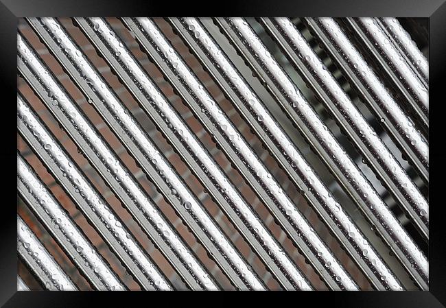 Diagonal Bars with Raindrops Framed Print by Jean Gill
