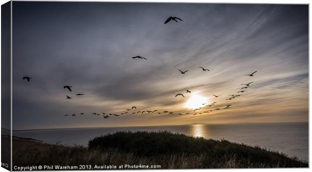 Flying into the sunrise Canvas Print by Phil Wareham
