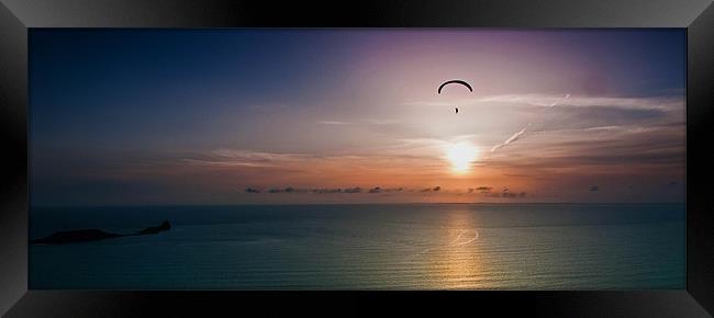 Paragliding over Worms Head Framed Print by Leighton Collins