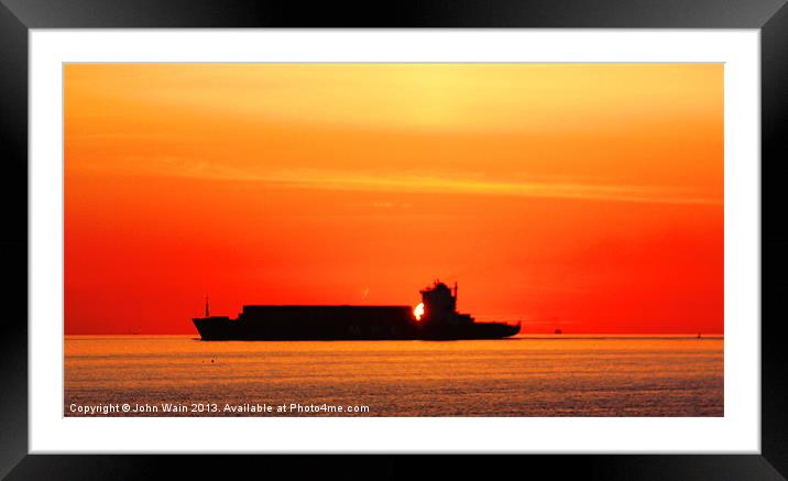 Sunset Silhouette Ship Framed Mounted Print by John Wain