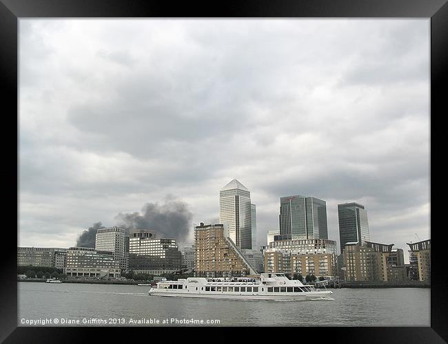 Smoke at Canary Wharf Framed Print by Diane Griffiths