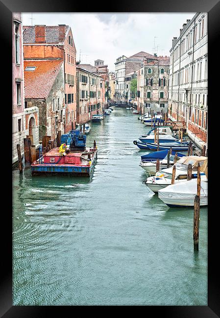 Canal Venice with motorboats Framed Print by Jean Gill