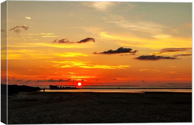 Setting Sun Fort Myers Florida Canvas Print by Pete Lawless