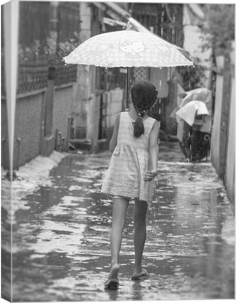 Girl In Rain Canvas Print by Clive Eariss