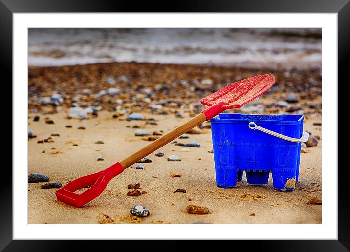 A bucket and spade Framed Mounted Print by Mark Bunning