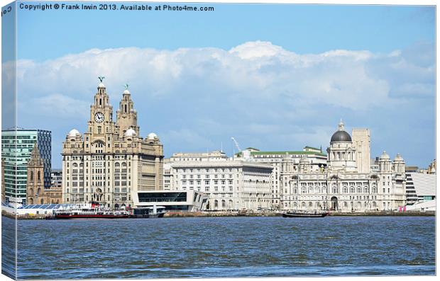 Liverpools Three Graces from the river. Canvas Print by Frank Irwin
