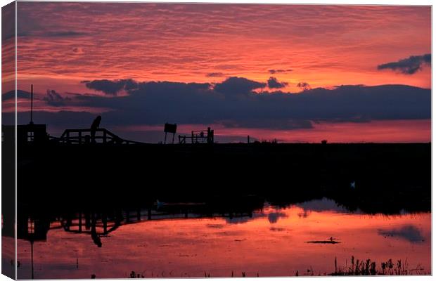 Sunset over the old weir Canvas Print by Gary Pearson