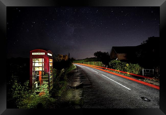 Rundown Phonebox By Night Framed Print by Malcolm Wood
