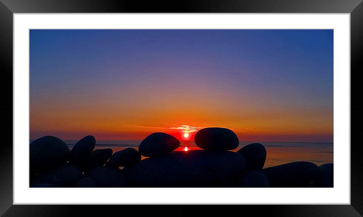 Sunset Through The Pebbles Framed Mounted Print by Pete Moyes