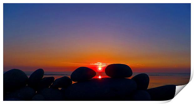 Sunset Through The Pebbles Print by Pete Moyes