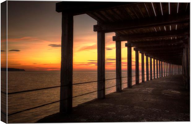Whitby - Under the Boardwalk Canvas Print by Martin Williams