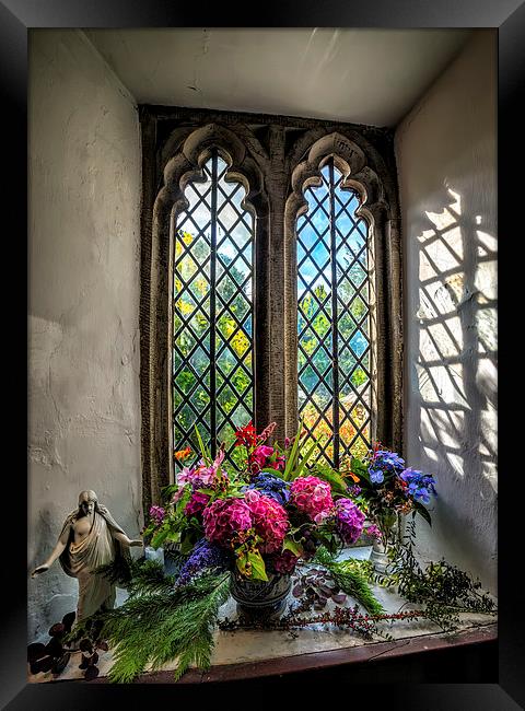 Chapel Flowers Framed Print by Adrian Evans