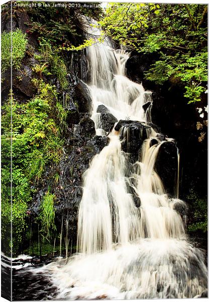 Dunvegan Castle Waterfall Canvas Print by Ian Jeffrey