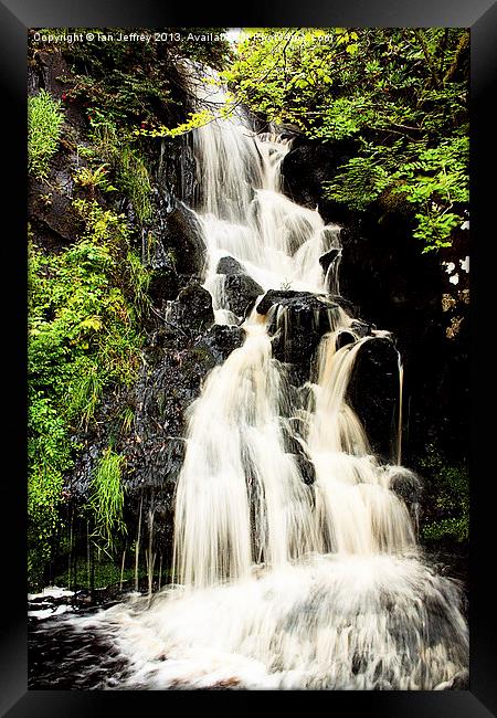 Dunvegan Castle Waterfall Framed Print by Ian Jeffrey