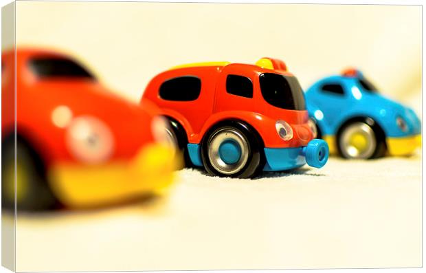 Colourful Toy Cars Canvas Print by Michael Moverley