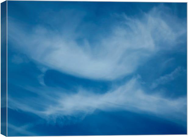 Kissing clouds Canvas Print by David Pyatt