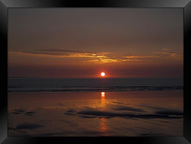 Reflections of the sunset Framed Print by Pete Moyes
