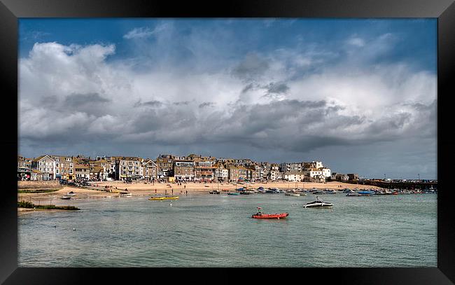 Rain clouds gather over St Ives Framed Print by Rosie Spooner