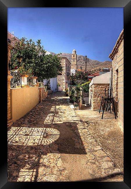 Shadows in the Lane Framed Print by Tom Gomez