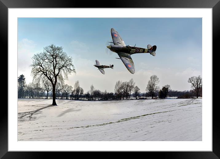 Low-flying Spitfires in winter Framed Mounted Print by Gary Eason