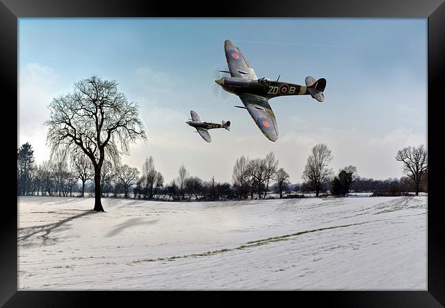Low-flying Spitfires in winter Framed Print by Gary Eason