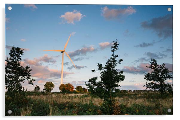 Wind turbine lit with evening light at sunset. Acrylic by Liam Grant
