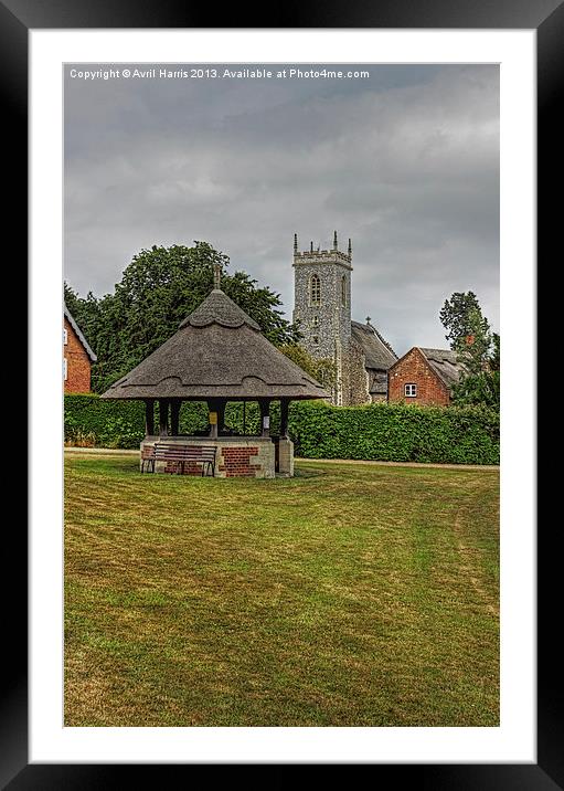 Woodbastwick village green and church Framed Mounted Print by Avril Harris