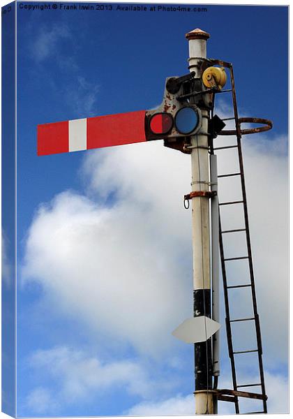 Old type semaphore signal set against a blue sky Canvas Print by Frank Irwin