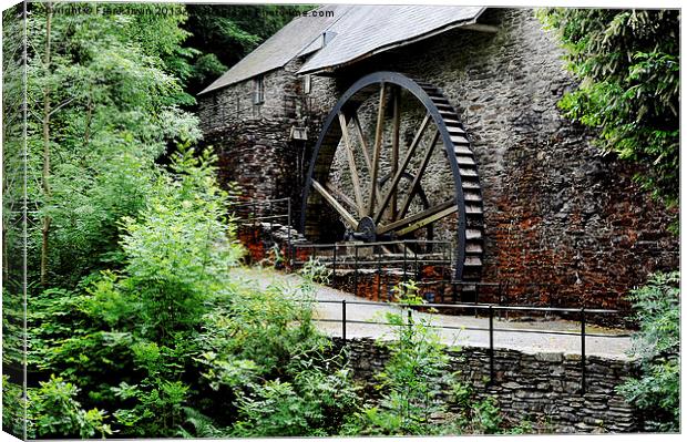 Water wheel from times gone by Canvas Print by Frank Irwin