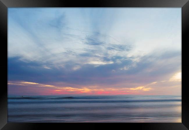 Sunset at the seaside Framed Print by Ian Jones