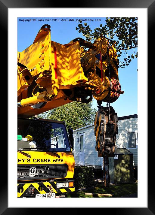 A large mobile crane at a caravan site Framed Mounted Print by Frank Irwin