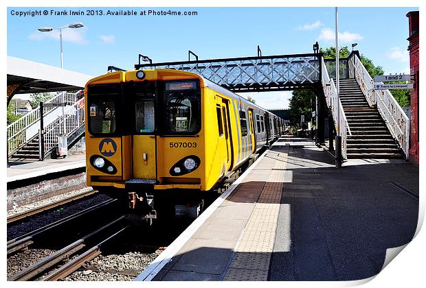 A Merseyrail train, above ground Print by Frank Irwin