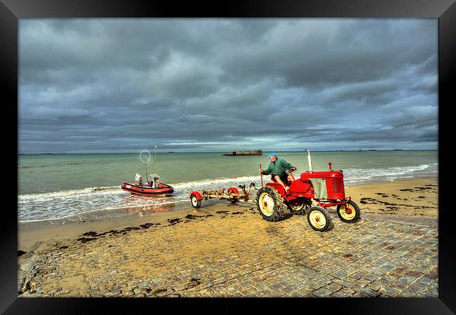 Red Tractor at Arrowmanches Framed Print by Rob Hawkins