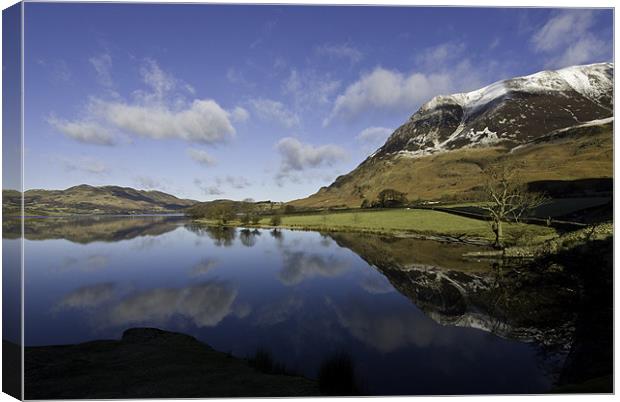 Reflections of Crummock Water Canvas Print by James Lavott