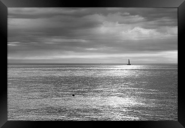 Sailing the silver sea. Framed Print by Ian Middleton