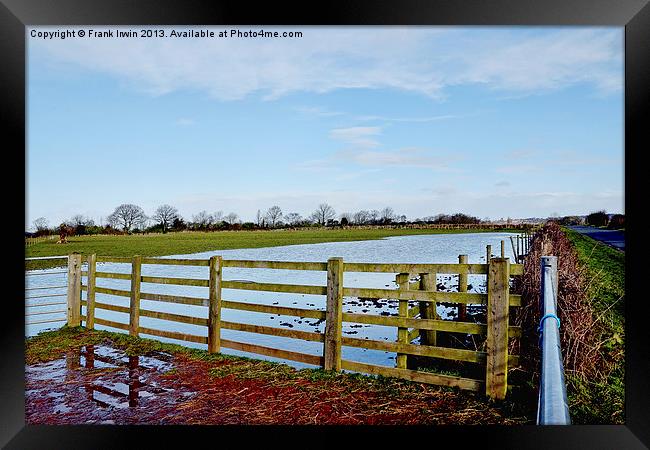 A flooded field on Wiral Framed Print by Frank Irwin