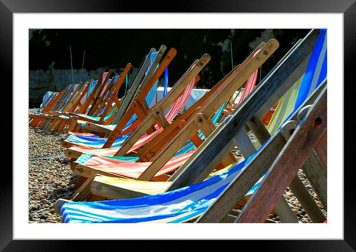 Deckchairs on the beach at Beer in Devon Framed Mounted Print by Peter McCormack