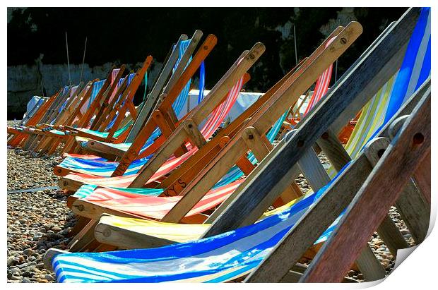 Deckchairs on the beach at Beer in Devon Print by Peter McCormack