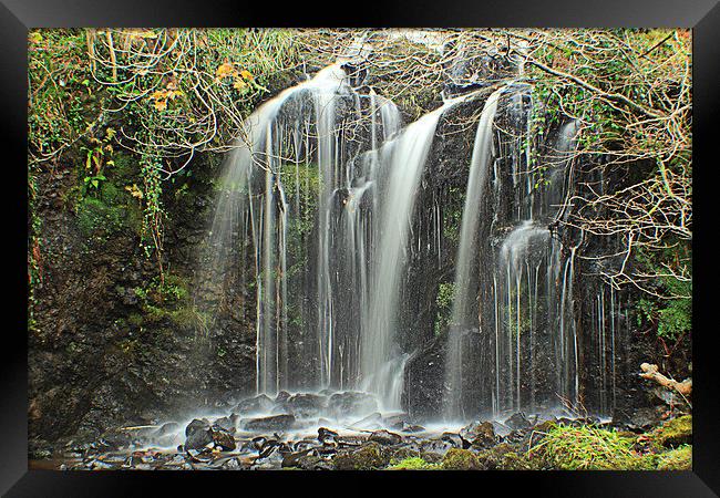 waterfall in the spring time Framed Print by Peter Mclardy
