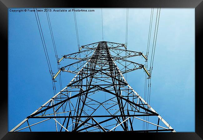 A super pylon, from below against a blue sky Framed Print by Frank Irwin