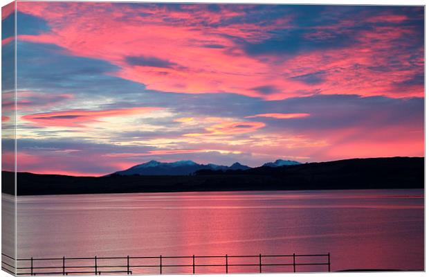 Beautiful fire in the sky over Arran Canvas Print by Peter Mclardy