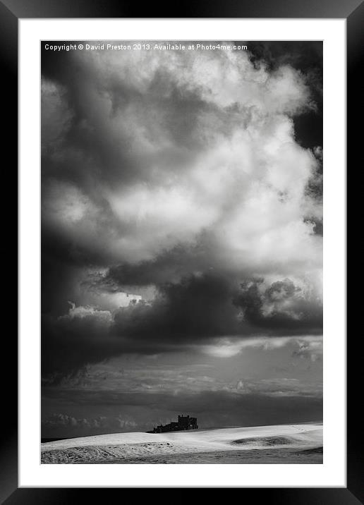 Bamburgh Castle and dramatic sky Framed Mounted Print by David Preston