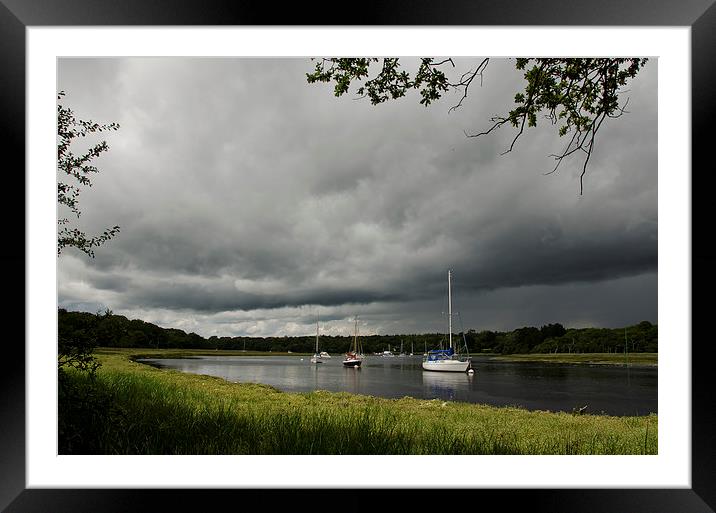 Stormy skys over Beaulieu river Framed Mounted Print by Dan Ward
