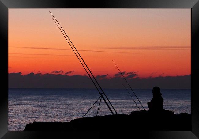 Fisherman at sunset Framed Print by Steve Frazer