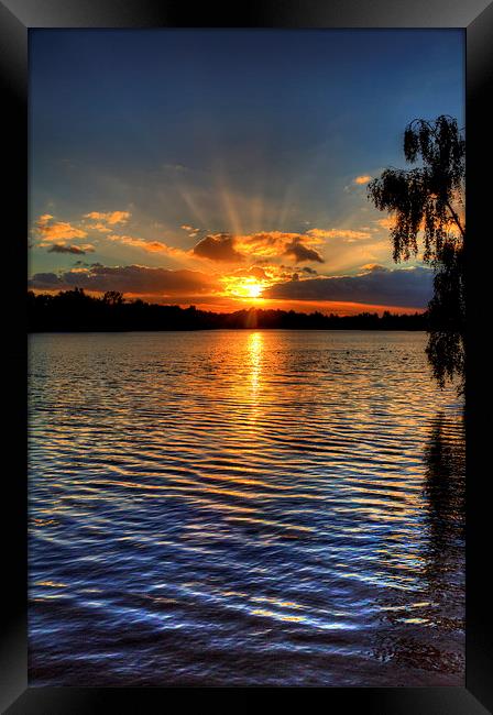 October lake sunset Framed Print by Simon West