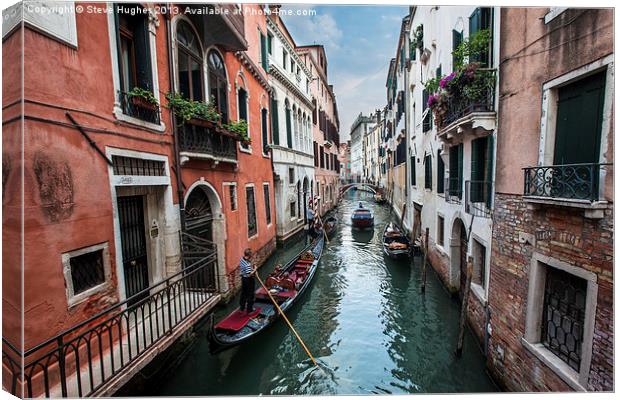 Gondola in Venetian canal. Canvas Print by Steve Hughes
