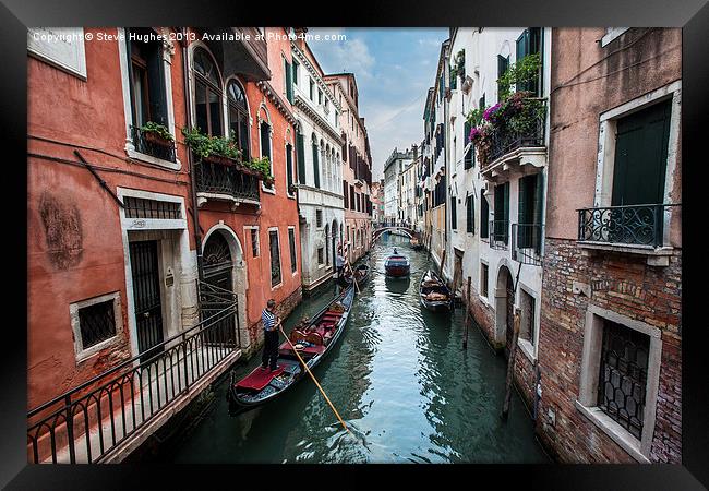 Gondola in Venetian canal. Framed Print by Steve Hughes