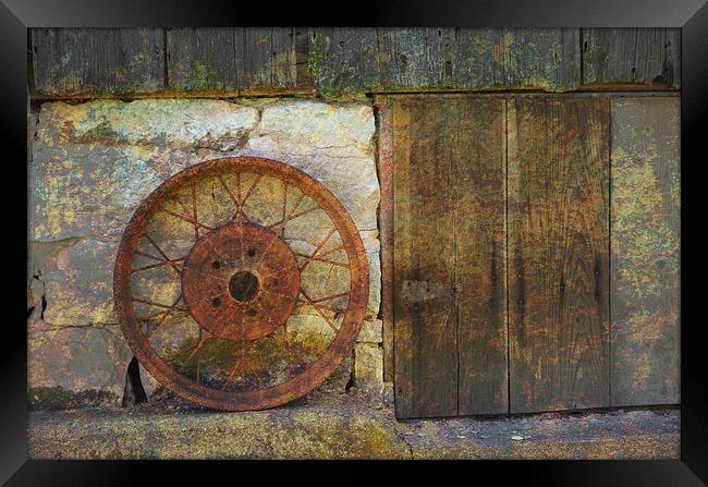 Rusty Wheel Framed Print by Pamela Briggs-Luther