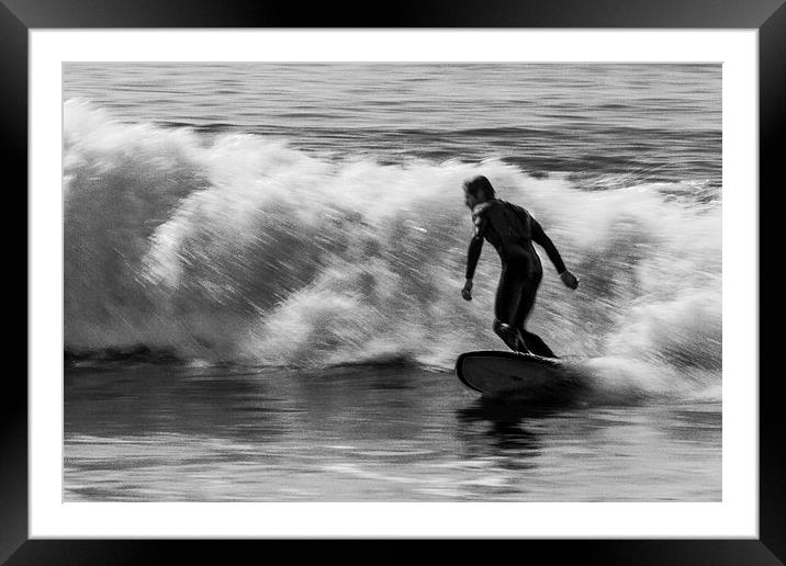 Surfer on a wave Framed Mounted Print by Ian Jones